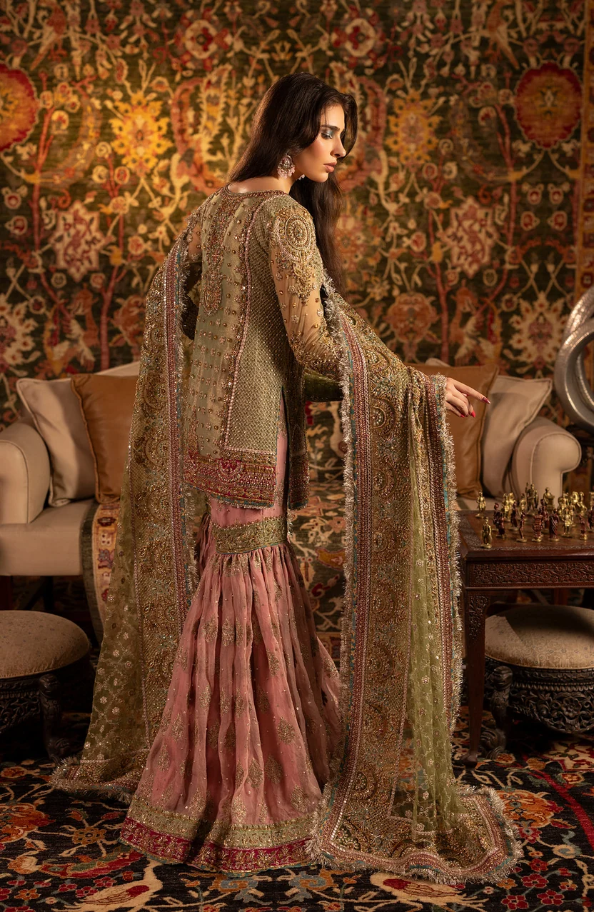 Detailed gold embroidery across the HSY Parizaad neckline