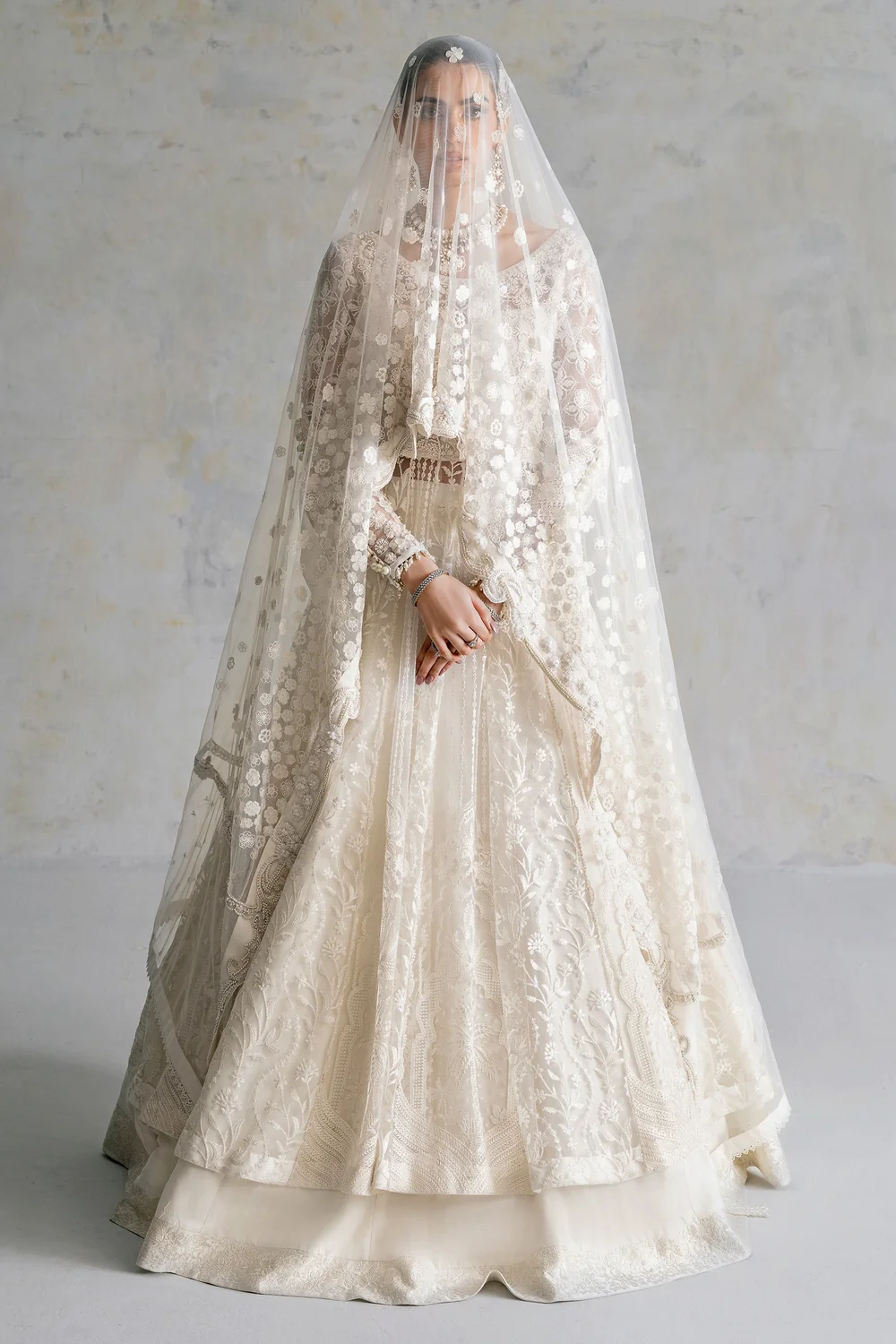 Pure white bridal dress with Kora Dabka adda work