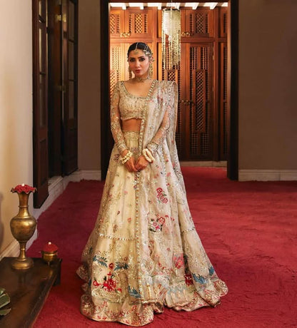 Rano ivory and gold bridal lehenga with multicoloured floral embroidery
