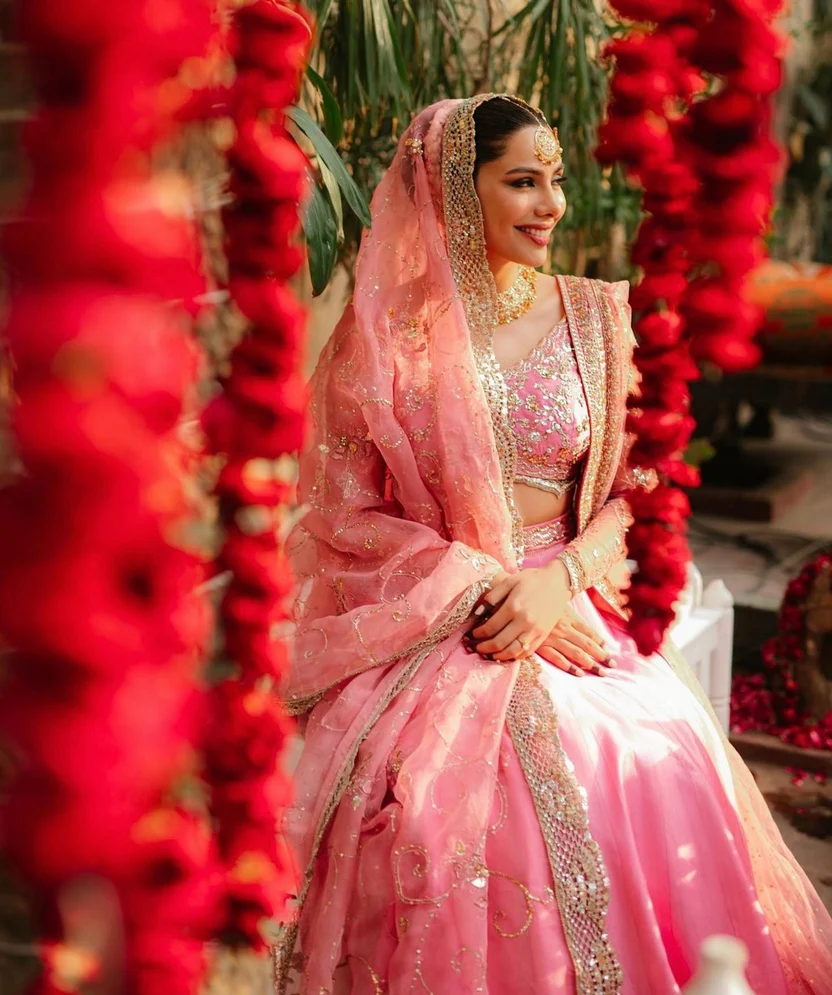 Rano’s Heirloom T9 blush-pink bridal outfit with gold embroidery