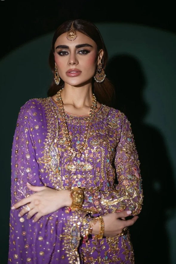 Nomi Ansari inspired purple formal wear