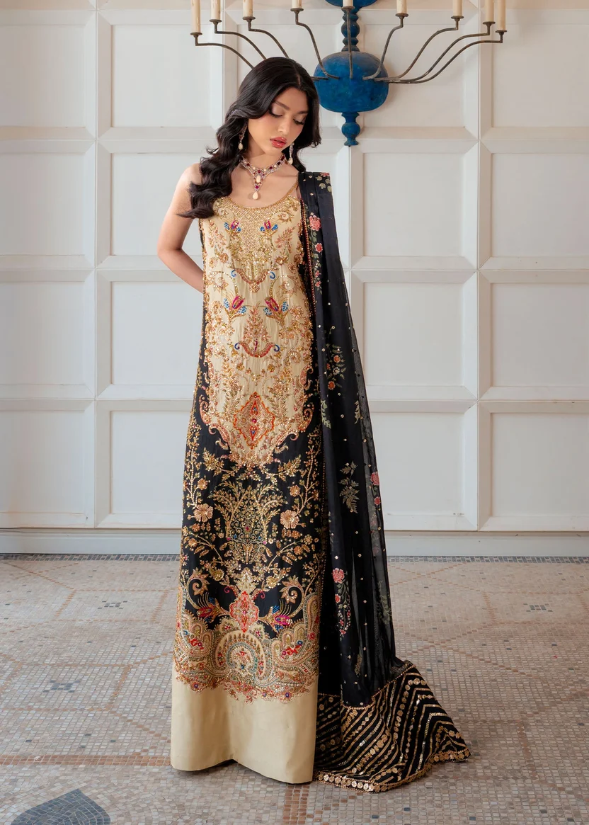 Detailed gold paisley embroidery with pink and turquoise accents