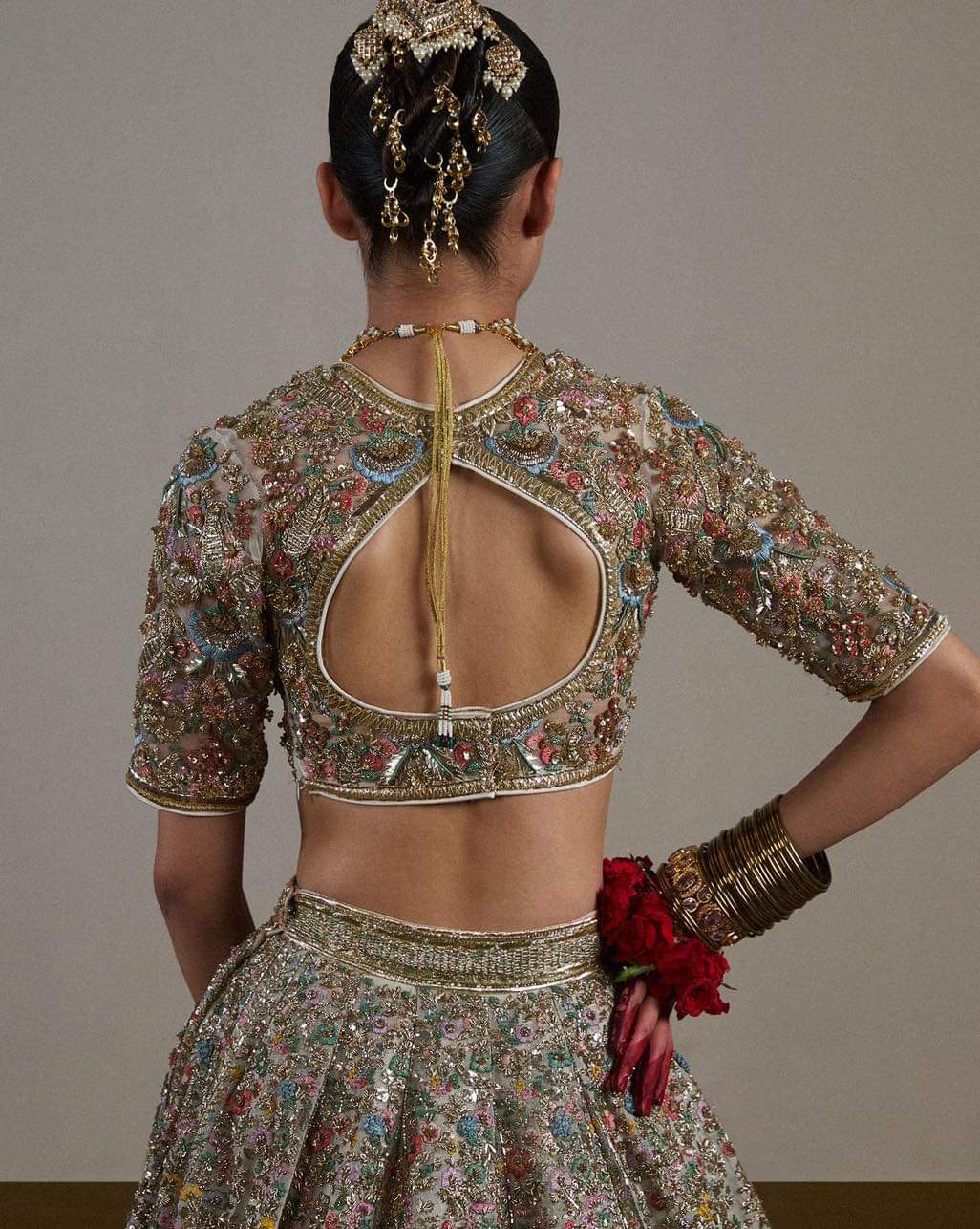 Sawara emerald-green outfit with contrasting magenta katan-silk dupatta