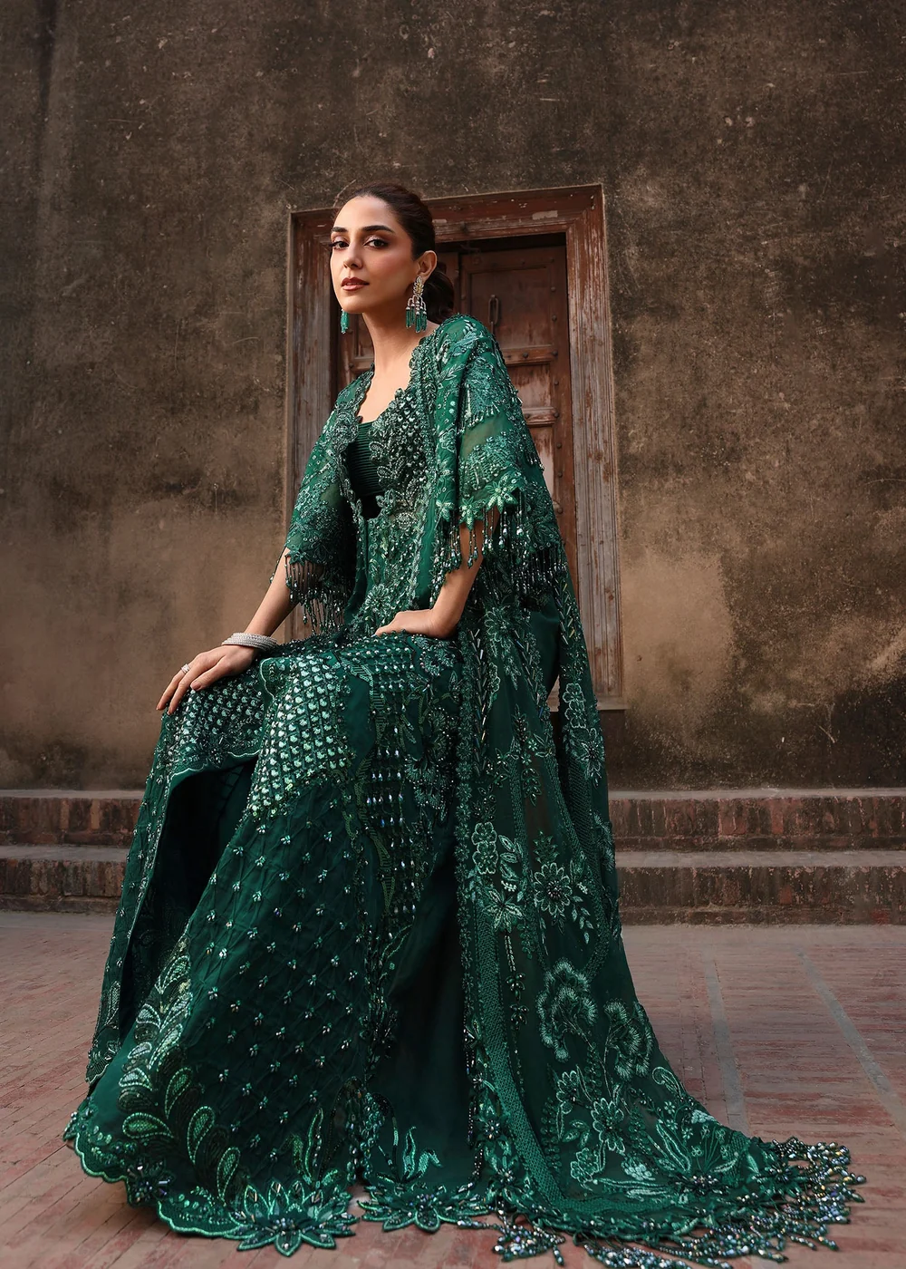 Embroidered jacket with dramatic fringed edges