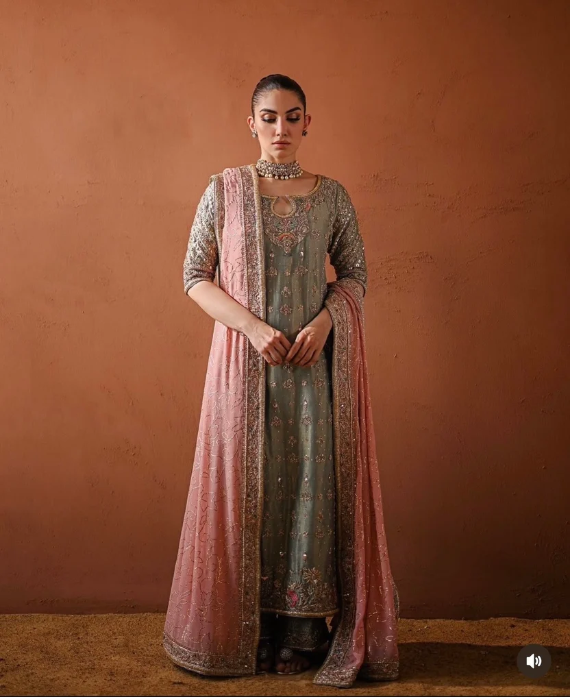 Shagna shirt featuring scattered motifs and detailed floral embroidery