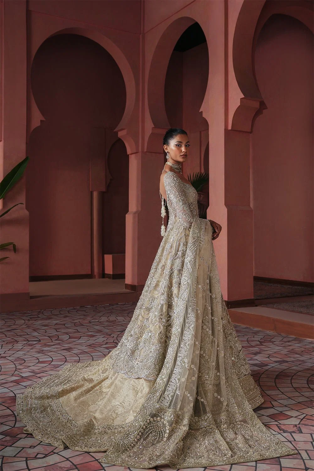 Champagne Pakistani bridal dress with zardozi work