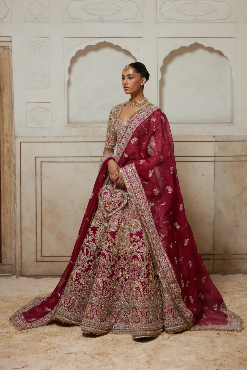 Red bridal blouse with antique-white embroidery and embellished neckline