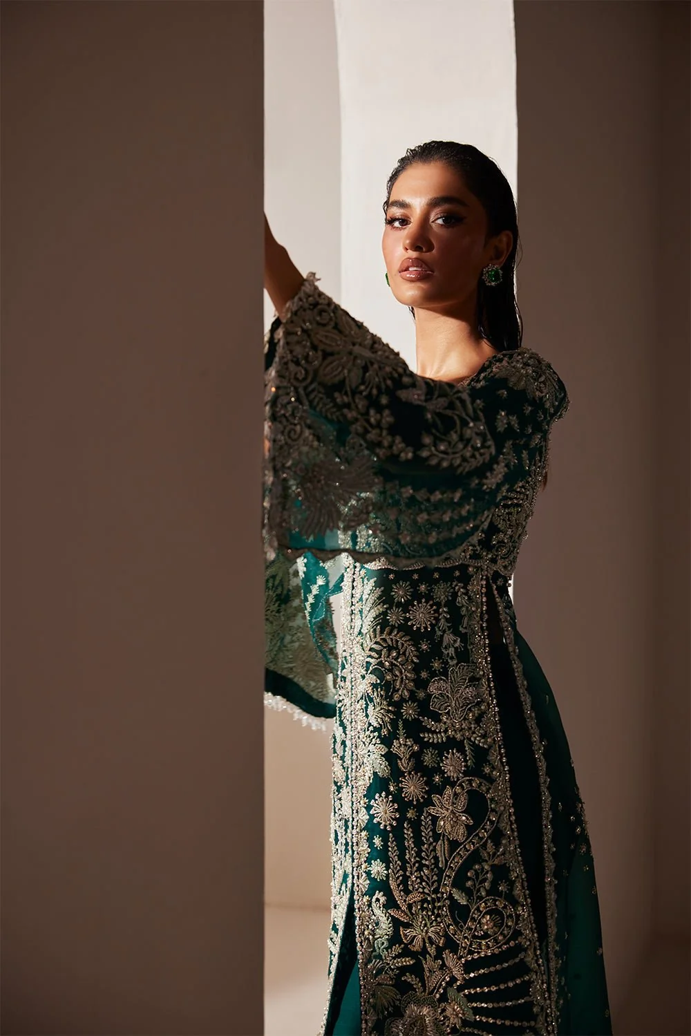 Emerald green Pakistani formal outfit with silver embroidery