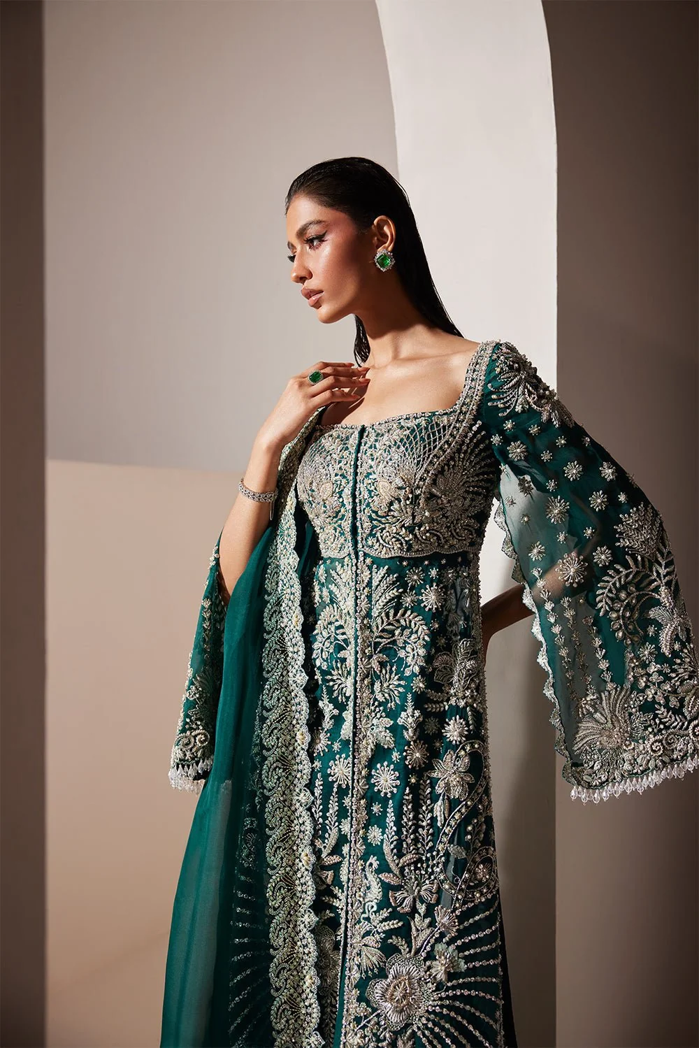 Emerald green Pakistani formal outfit with silver embroidery