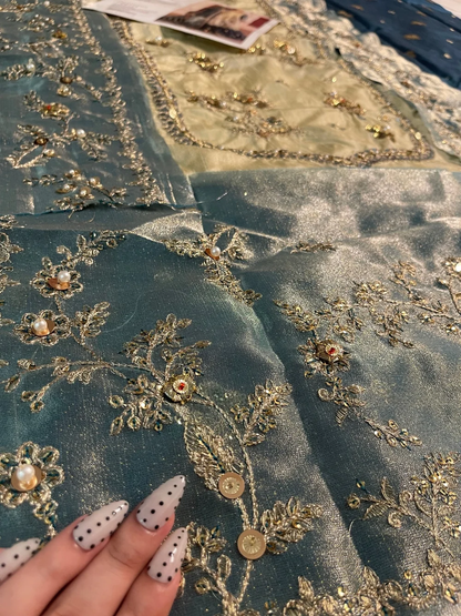 MNR inspired teal gold Pakistani wedding ensemble