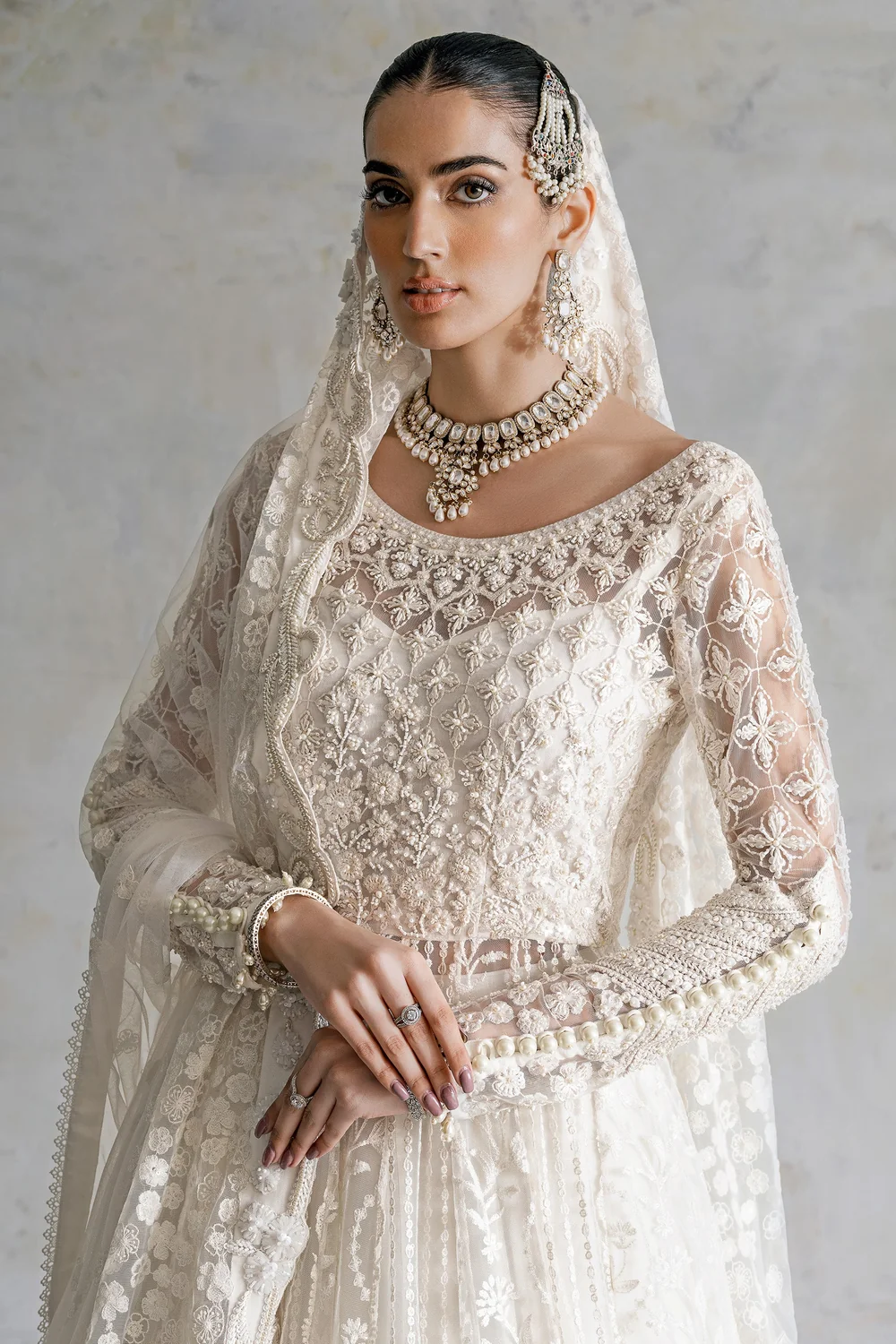 White handworked embroidered bridal ensemble