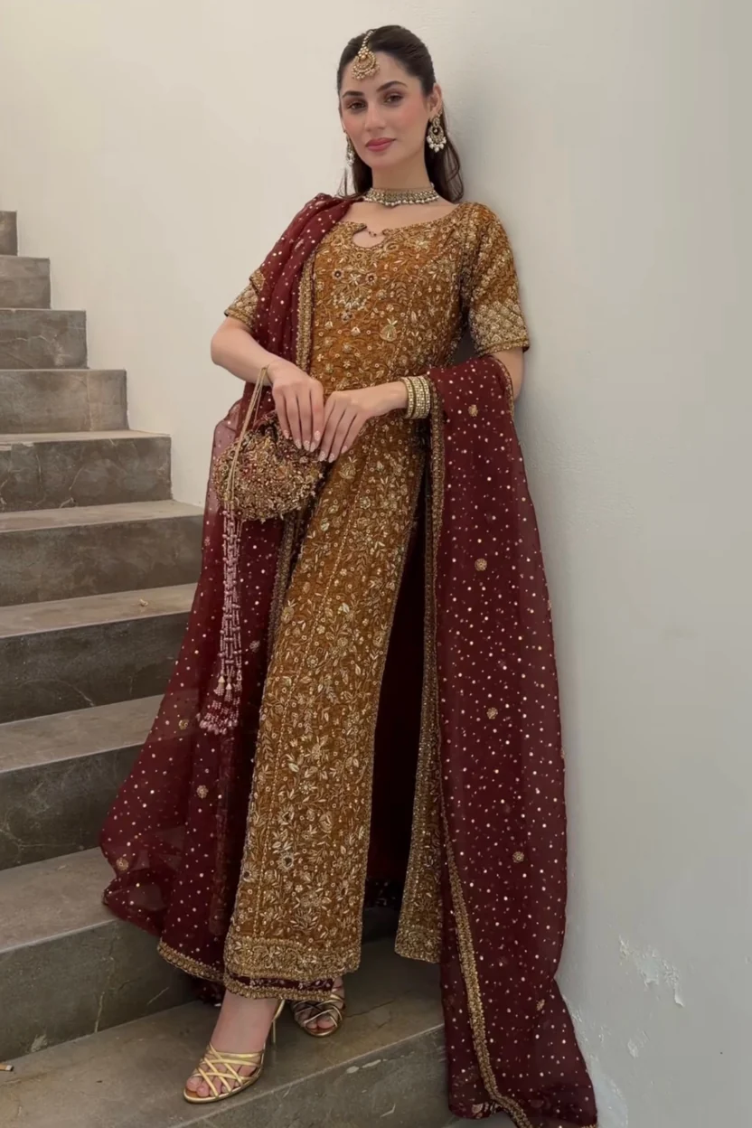Zeeshan Danish Rust and Burgundy Pakistani formal ensemble